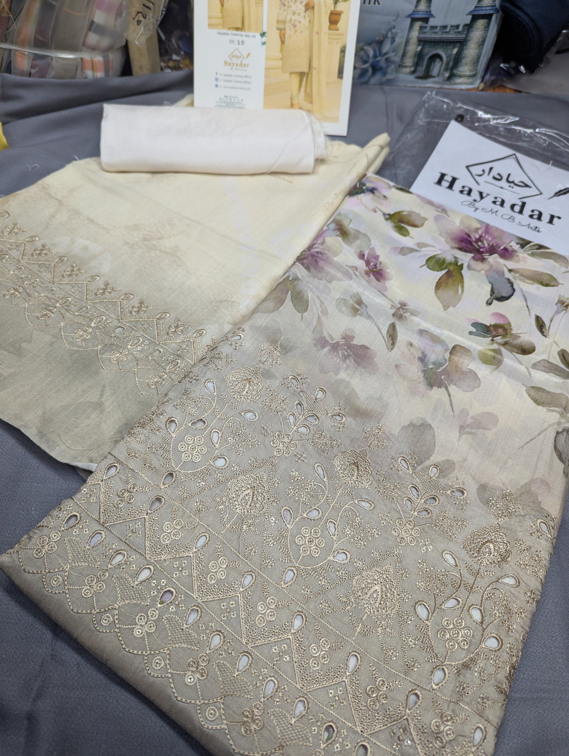 Off-white viscose winter collection 3-piece embroidery set by Hayadar Clothing with export quality print and intricate design.