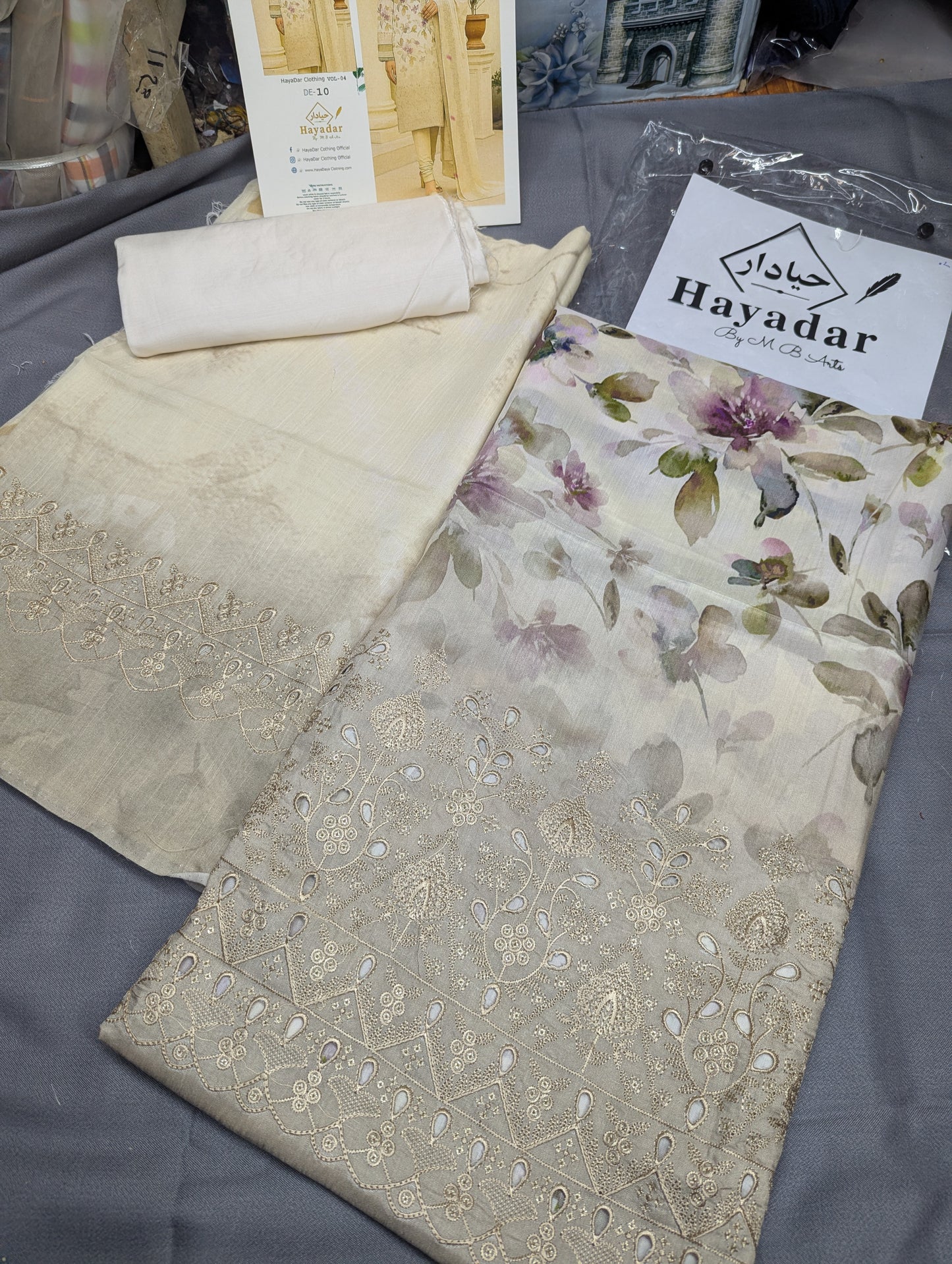 Off-white viscose embroidery winter collection 3-piece set by Hayadar Clothing, featuring elegant print and high-quality fabric.