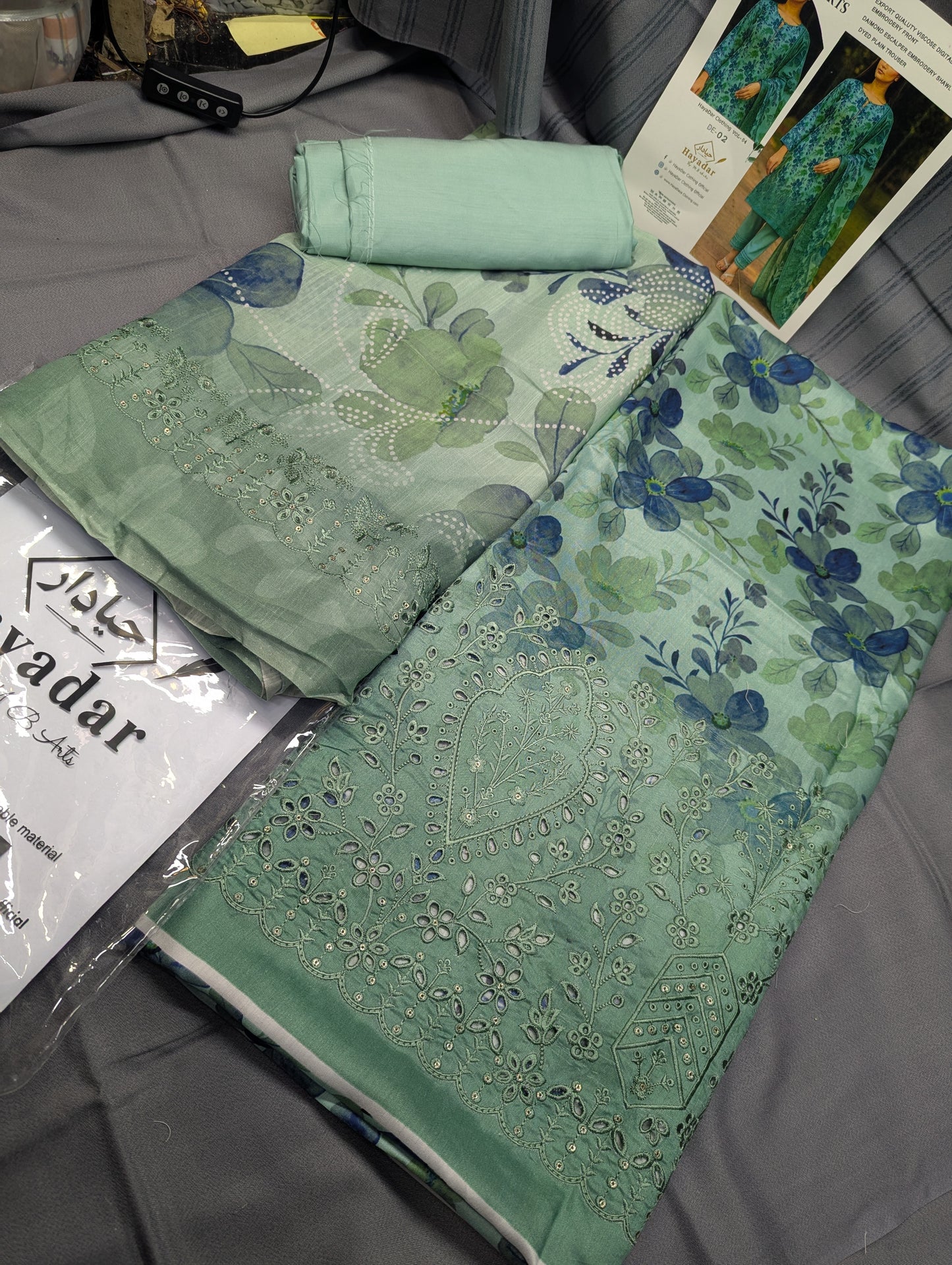 Light green 3-piece viscose embroidery winter outfit by Hayadar Clothing, featuring export quality print and stylish design.