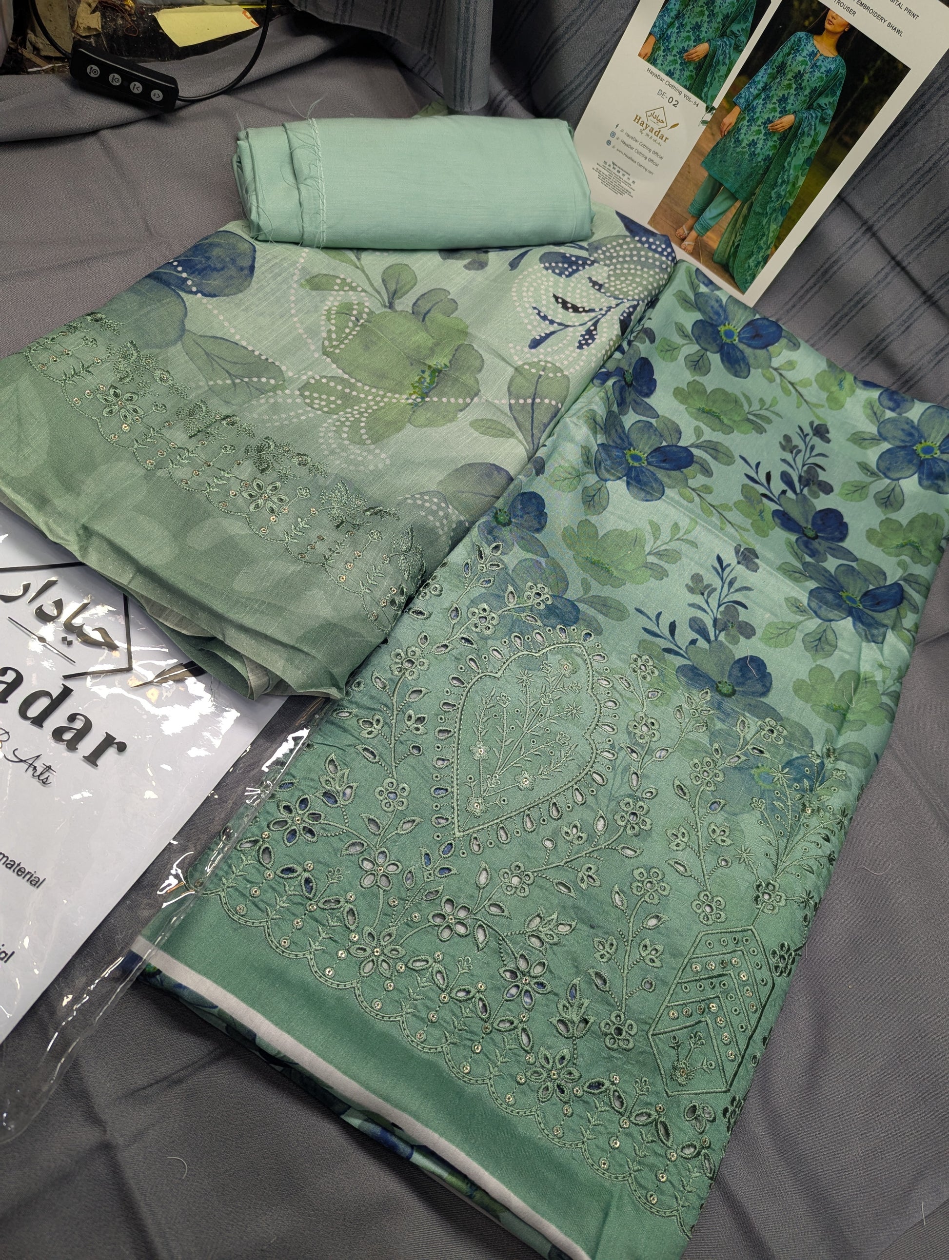 Light green 3-piece viscose winter embroidery set by Hayadar Clothing, featuring export quality print and intricate embroidery details.