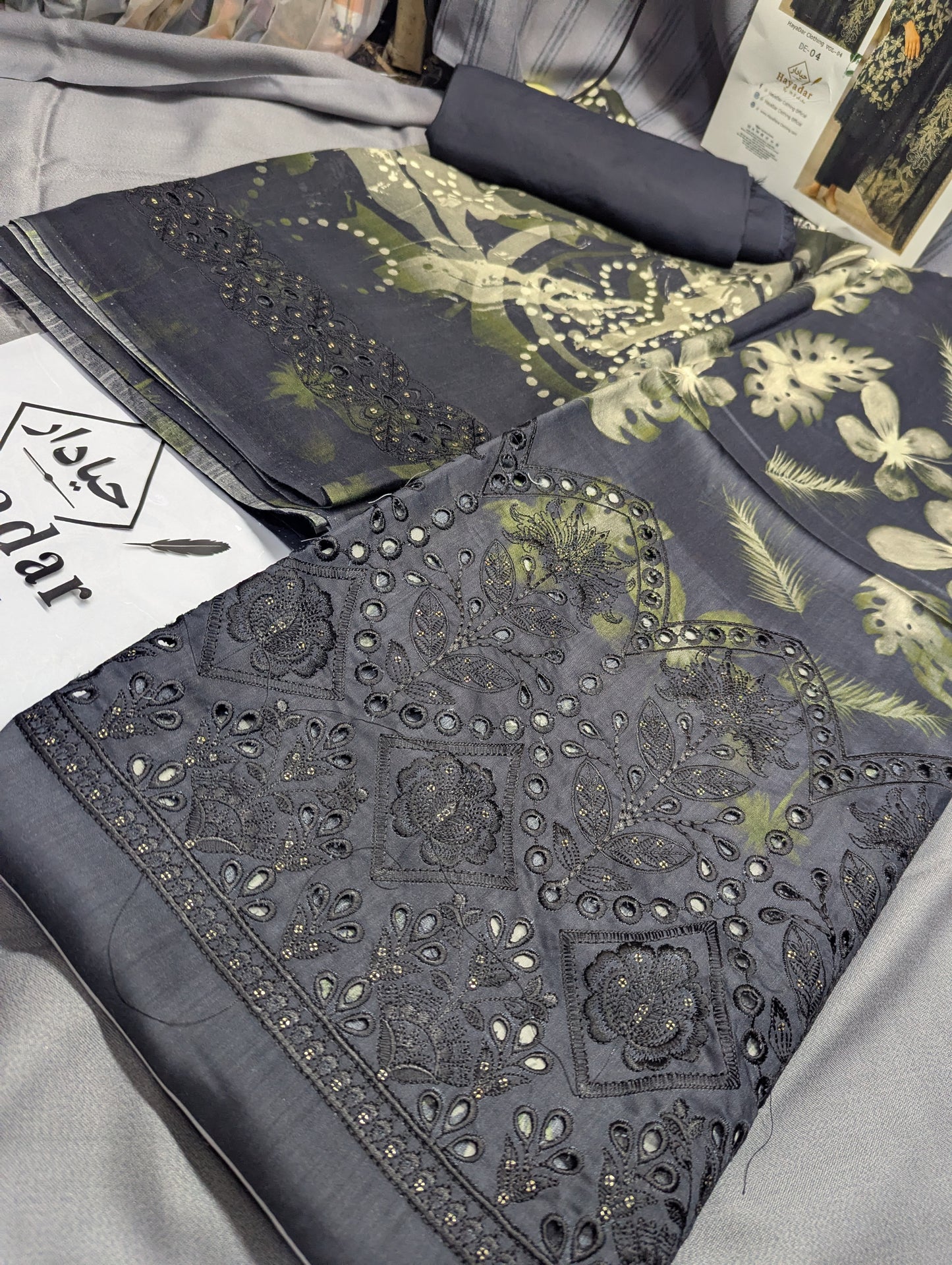 Black viscose 3-piece embroidery winter outfit from Hayadar Clothing, featuring export quality print and stylish design.