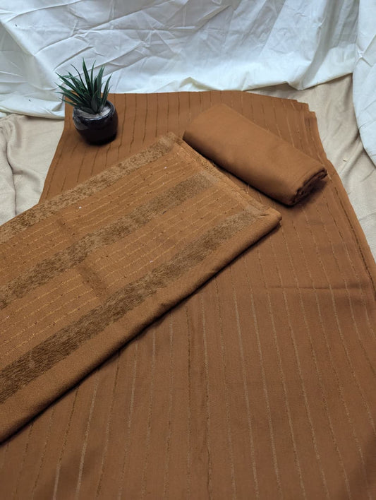 Rust-colored Hayadar Clothing 3-piece Alpine Velvet Marina set with vertical line design, showcasing luxurious fabric and stylish details.