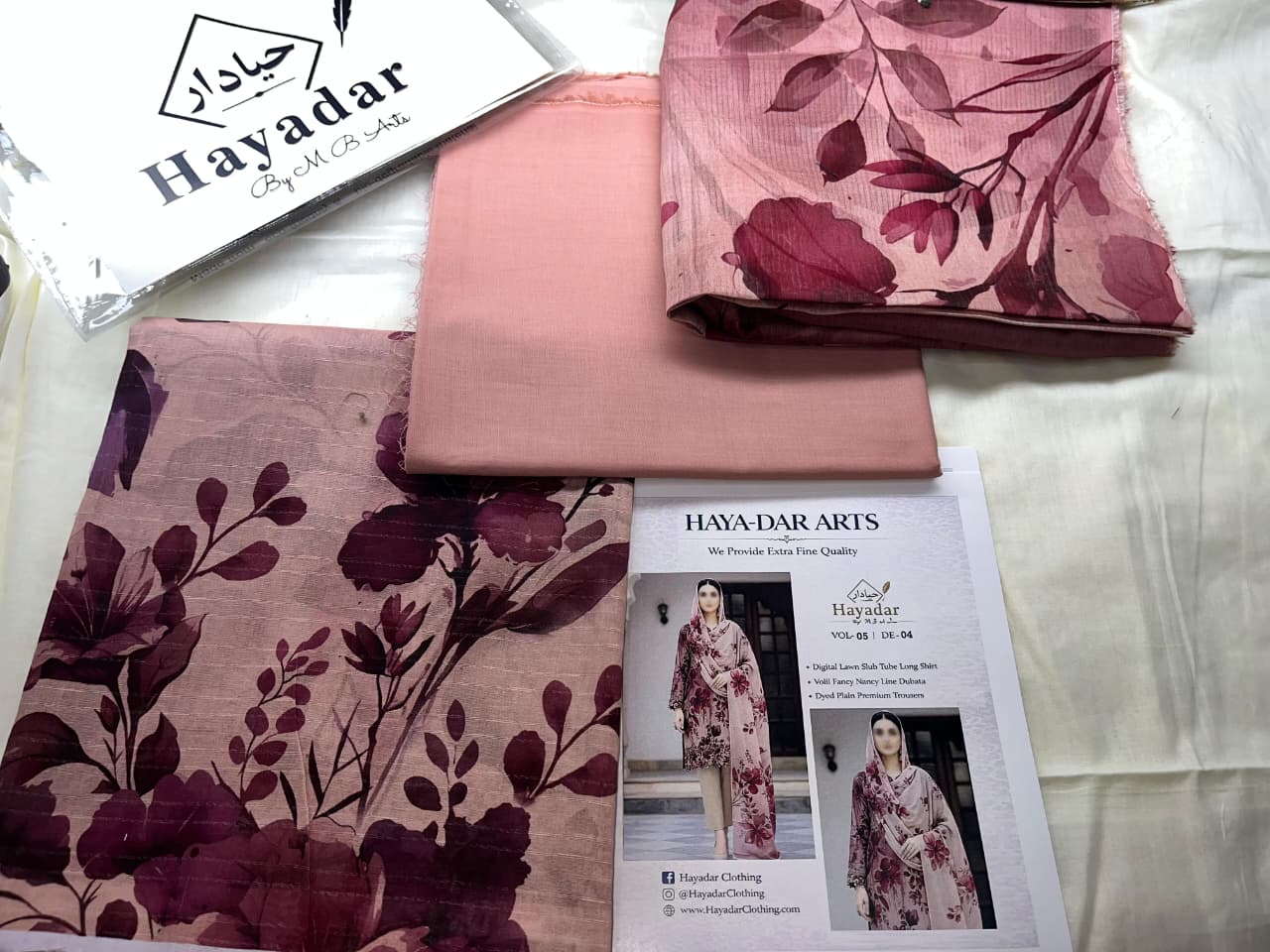 Bright peach 3-piece premium lawn set with rice slub fabric and voil dupatta by Hayadar Clothing, perfect for summer wear.