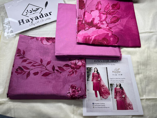 Magenta pink 3-piece lawn suit with rice slub fabric and sheer voil dupatta by Hayadar Clothing, displayed on a hanger.