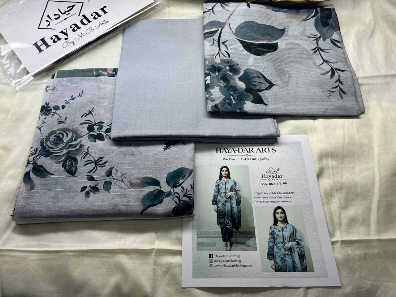 Ash grey 3-piece premium lawn suit by Hayadar Clothing with rice slub fabric and lightweight voil dupatta, elegant traditional style.